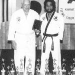 Franz, at age 76, Receiving An Award from His Taekwondo Instructor, Richard Anderson 