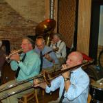 Chris Stind, cornet, Jack Kuncl, banjo, Mike Walbridge, tuba, Tom Bartlett, trombone